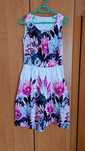 Elegancka sukienka bez rękawów Quiosque r. 36