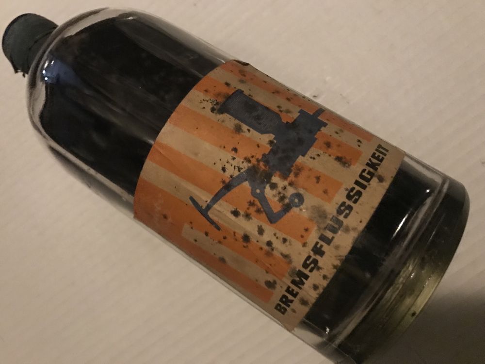 Stara kolekcjonerska butelka z czasow PRL, produkt DDR/NRD płyn