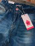 Nowe spodnie jeansowe Happy House
