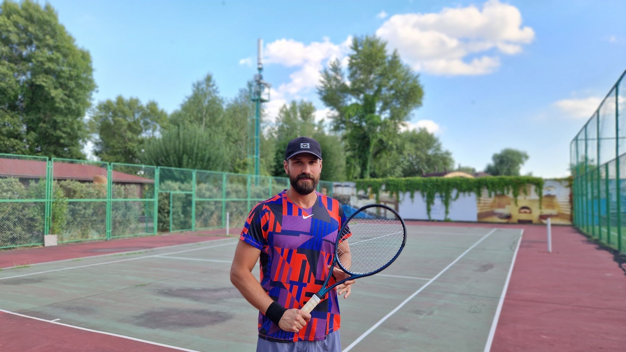 Тренер по теннису - Tennis coach