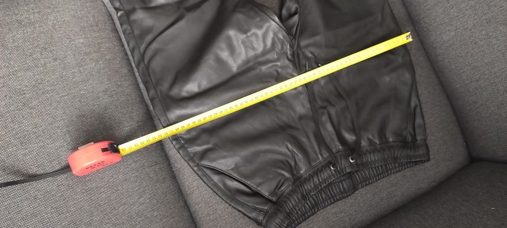 Czarne nowe skórzane cieple spodnie/getry