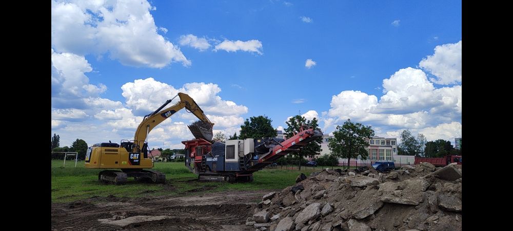 Kruszenie gruzu , przesiewanie ziemi, wyburzenia i rozbiórki