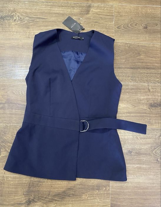 Отдам бесплатно новую синюю жилетку