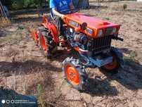trator kubota com frese
