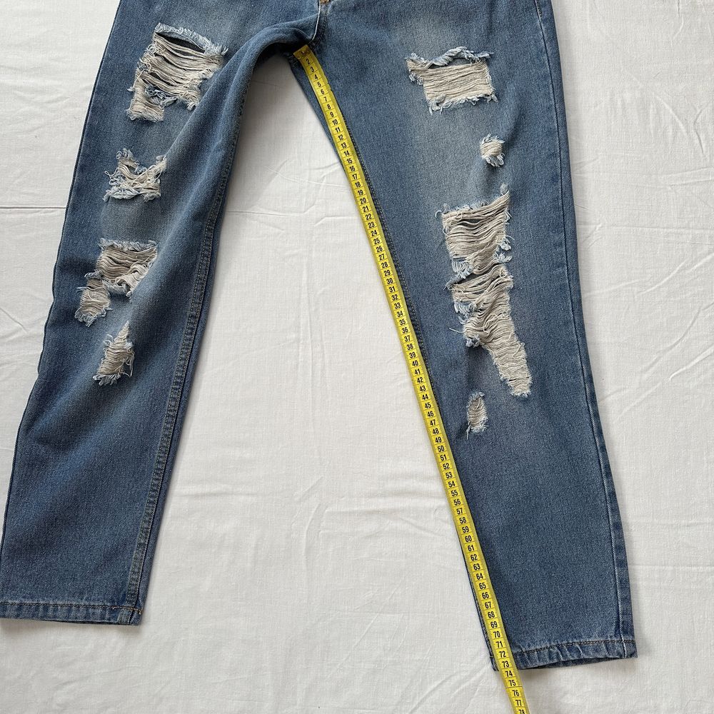 Голубі рвані джинси бойфренди з заниженою посадкою