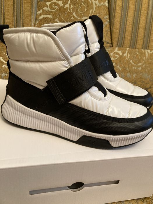 Продаю новые в упаковке зимние кросовки ,из натуральной кожи кросоает