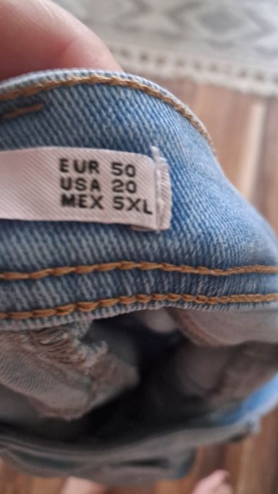 Spodnie z dziurami 48/52