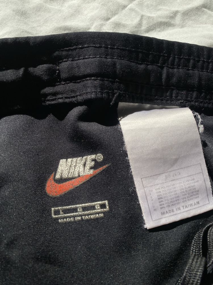 Жіночі чорні велосипедки масло шорти для спорту nike dri fir розмір L