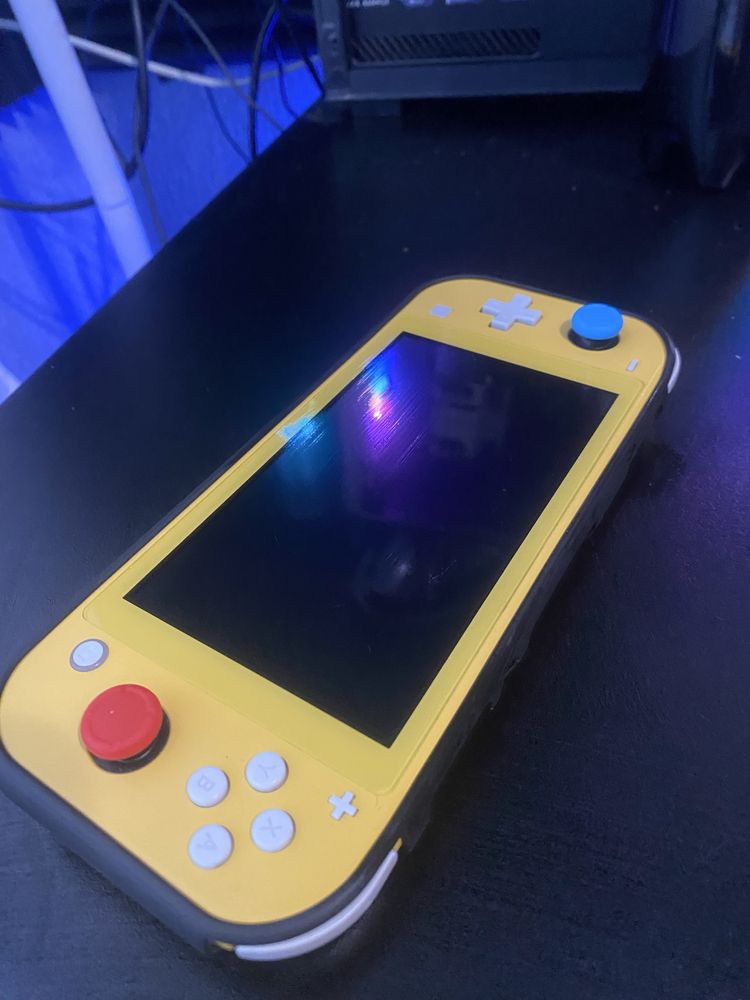 Nintendo Switch Lite + гра Zelda + чохол