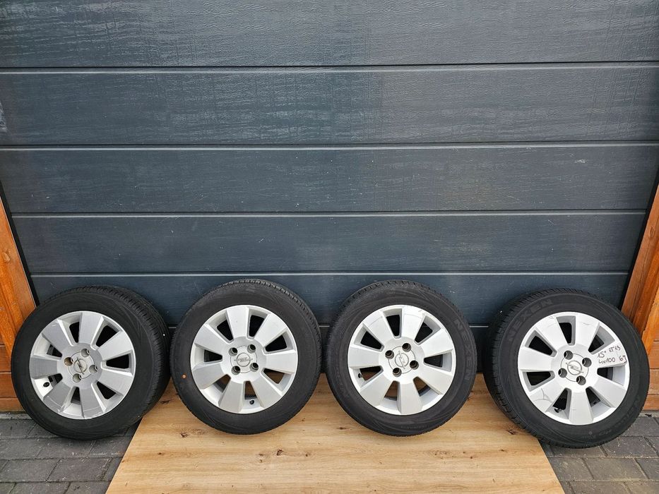 KOŁA FELGI ALUMINIOWE OPONY LETNIE 15 CALI OPEL ASTRA G H MERIVA A CORSA C D 4X100 185/60/15 ET43