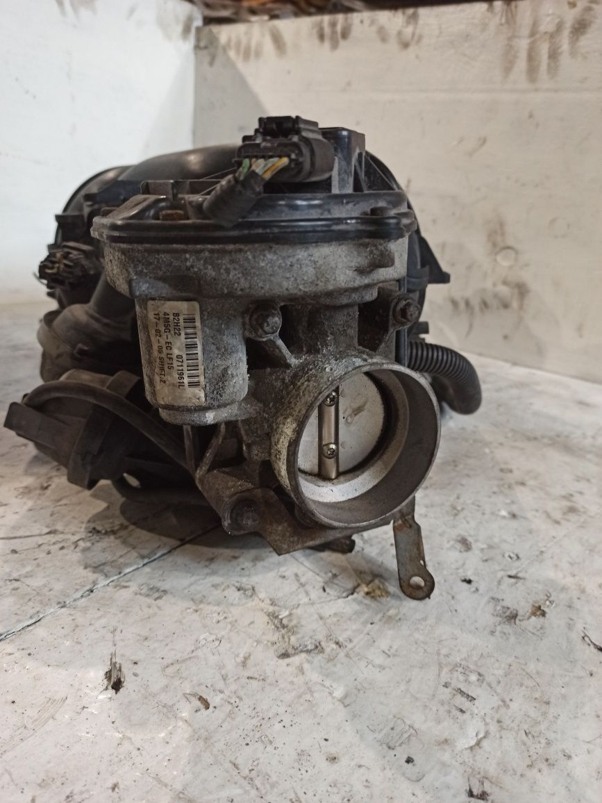 Впускний колектор 4m5g9424fp Volvo S40 V50 C30 Ford Focus C-max 1.8