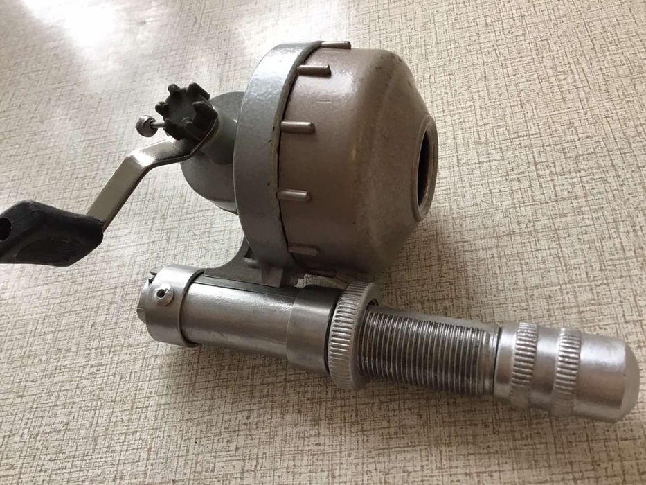 Спиненговый держатель катушки