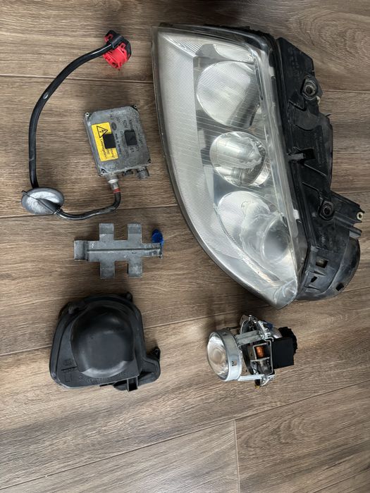 Lampa lewa bi-xenon Hella Passat B5 fl reflektor