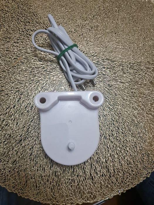 Oryginalna ładowarka do irygatora firmy Nevadent .