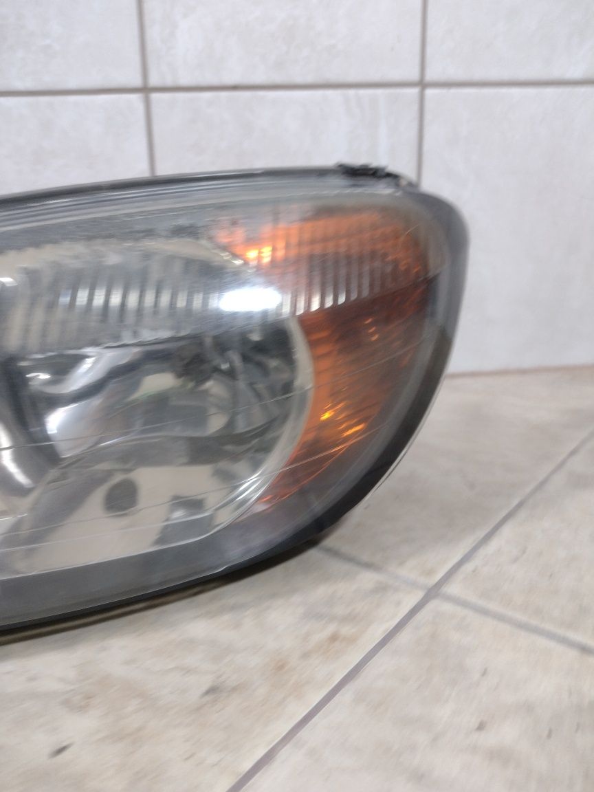 Primera P11 lampa reflektor przód lewy Europa kompletna wysyłka Xenon