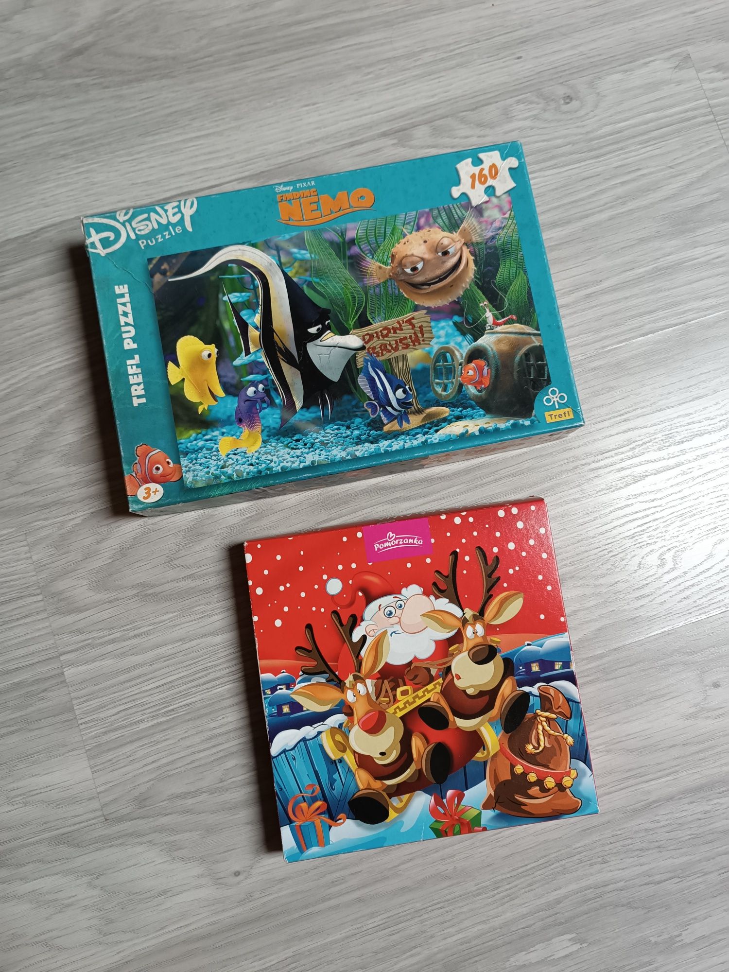 2 paczki puzzli gdzie jest Nemo świąteczne Mikołaj puzzle 3+