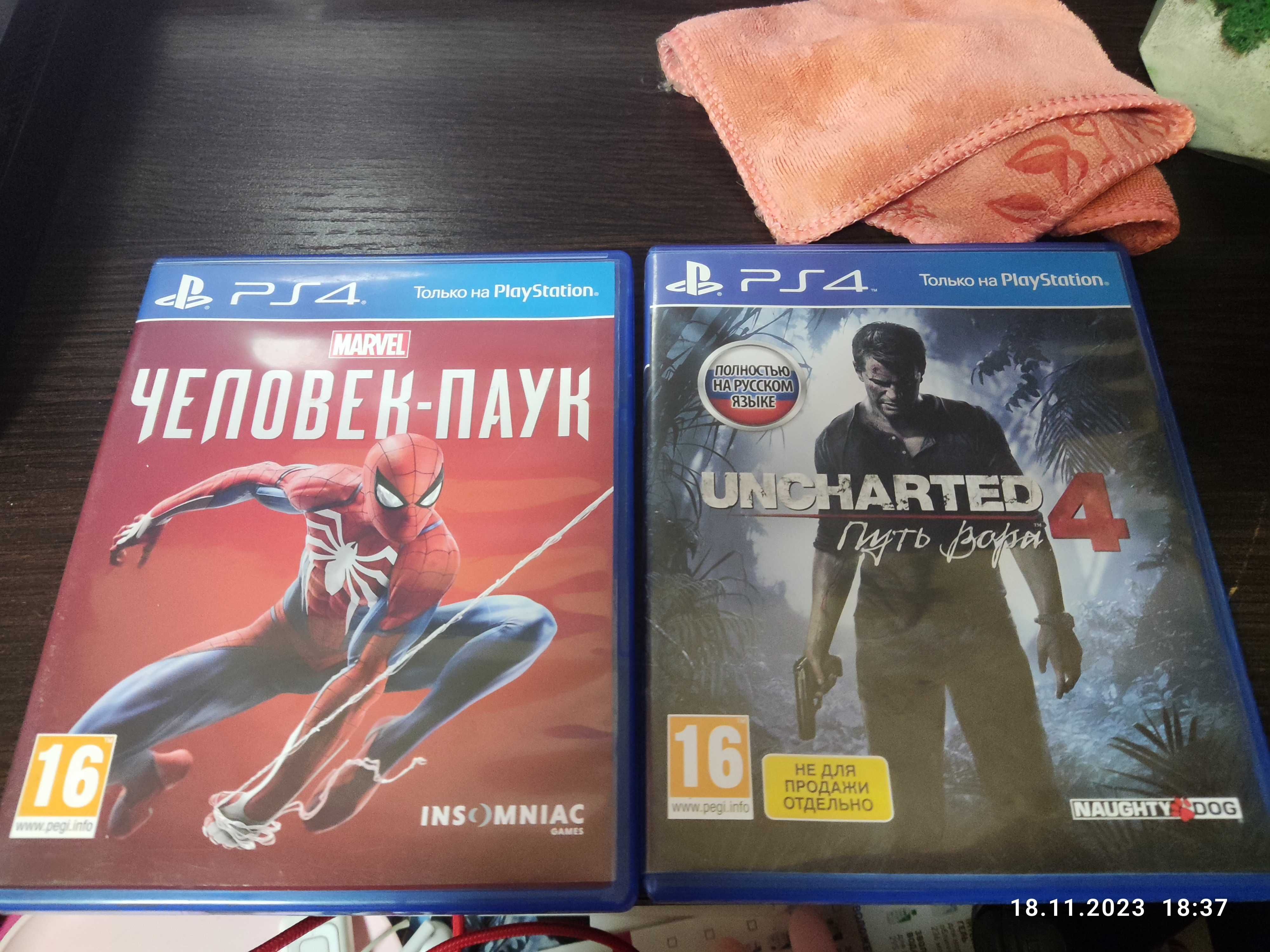 Продам 2 диска UNCHARTED 4 и Человек-паук