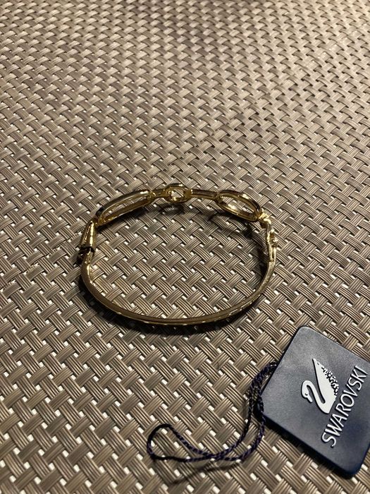 Swarovski bransoletka bangle - złoty kolor
