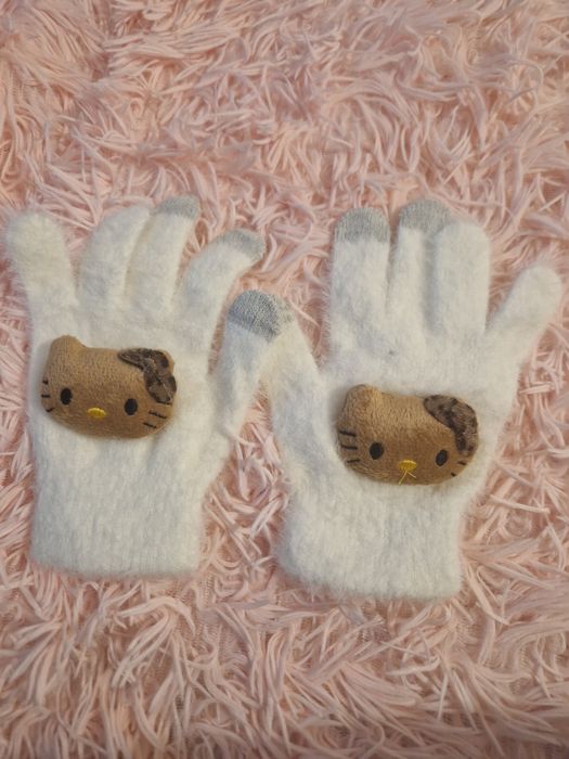 Luvas amorosas Hello Kitty e Stitch