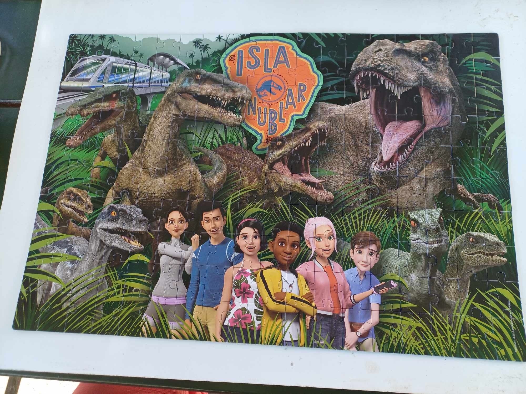 Puzzle Jurrasic World Netflix Clementoni 180 7+ z dinozaurami dinozaur