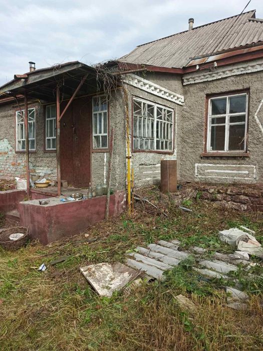 Будинок з земельною ділянкою