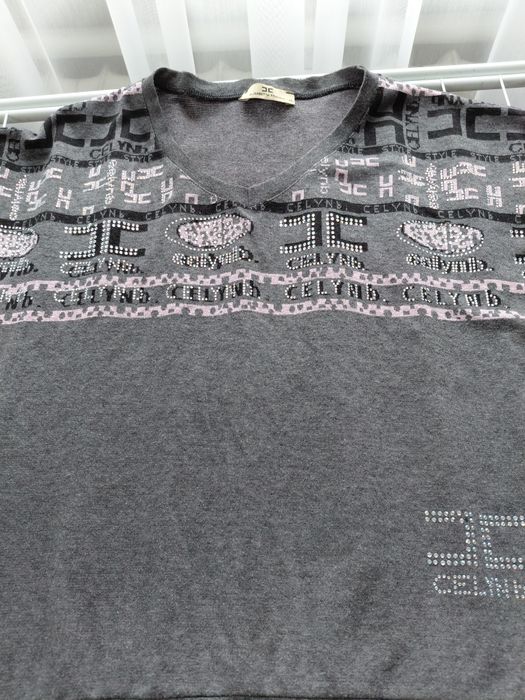 Жіноча кофтинка 48 розмір