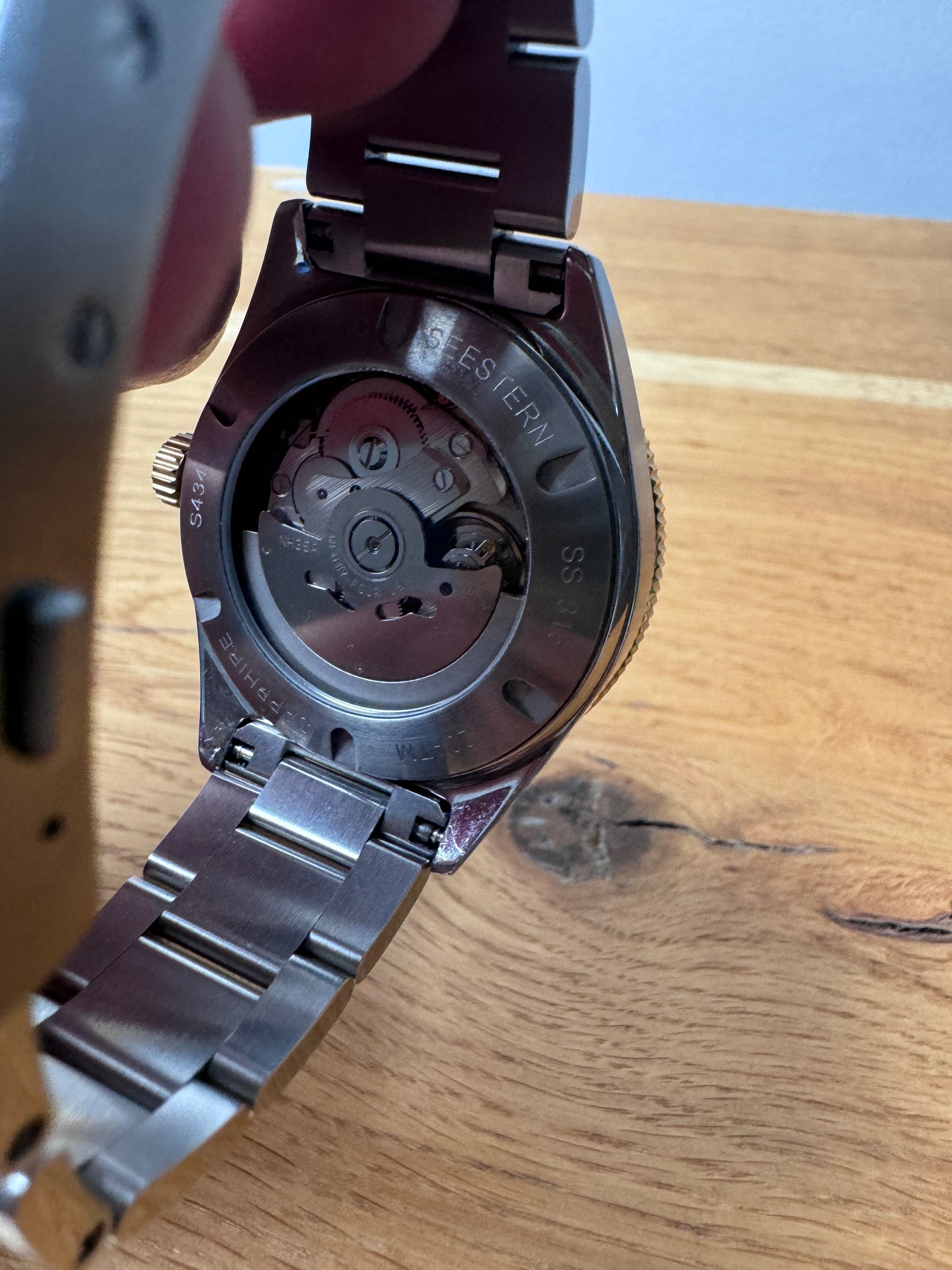 Seestern S434 automatyczny stalowy czarno - złoty zegarek z datą