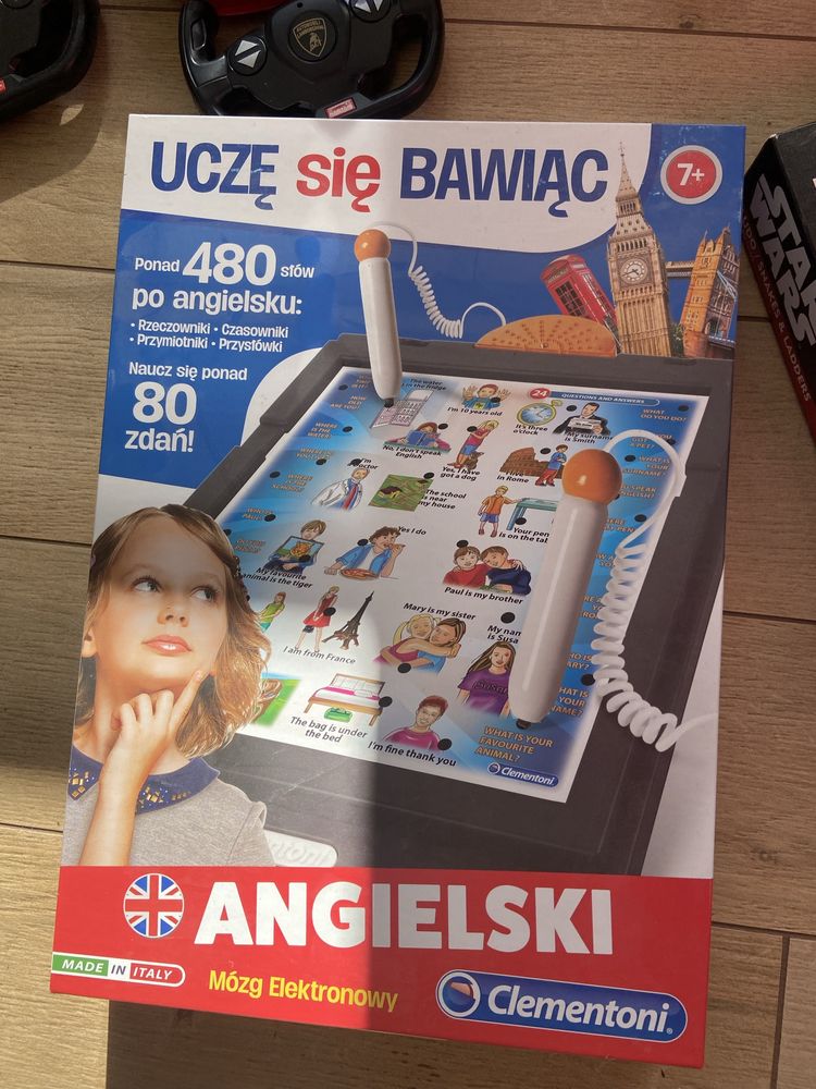 Auta dinozaury puzzle ksiażki