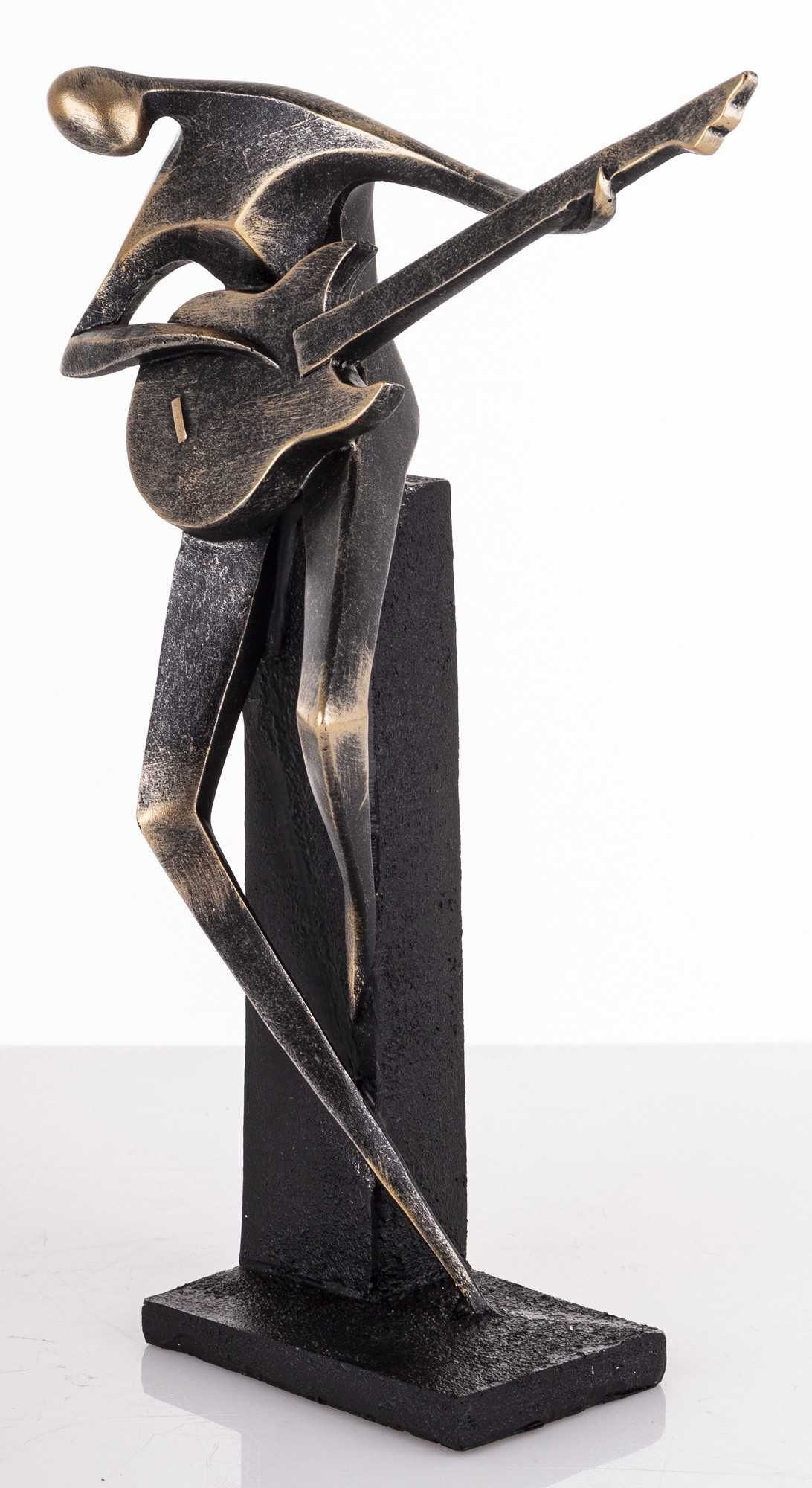 Czarna złota figurka muzyka grającego na gitarze dekoracja 175696