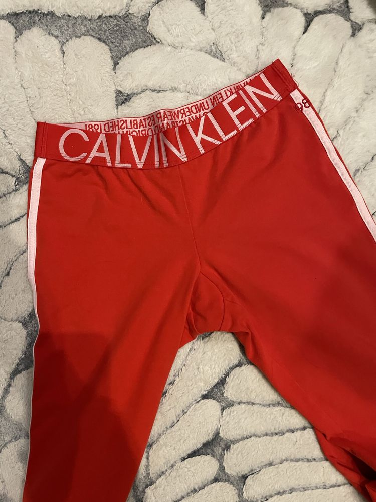 Czerwone leginsy Calvin Klein XS 34