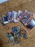 Cartas e tazos Yu Gi Oh