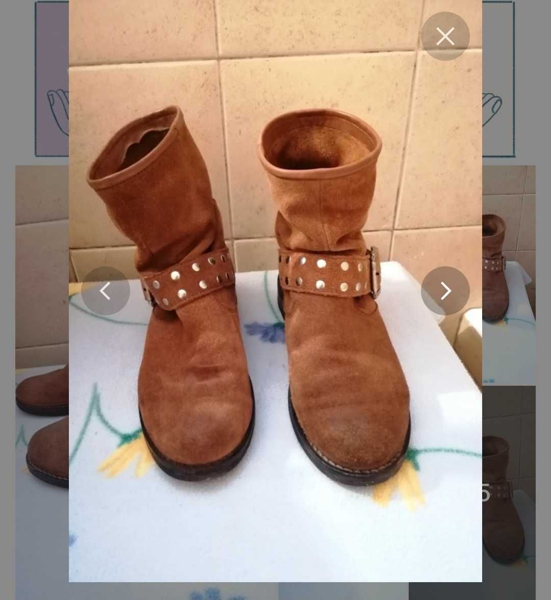 Botas em pele castanha