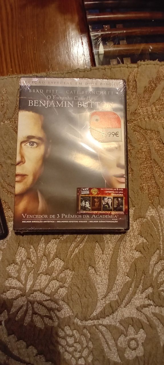 2 filmes dvd benjamin button e amistad