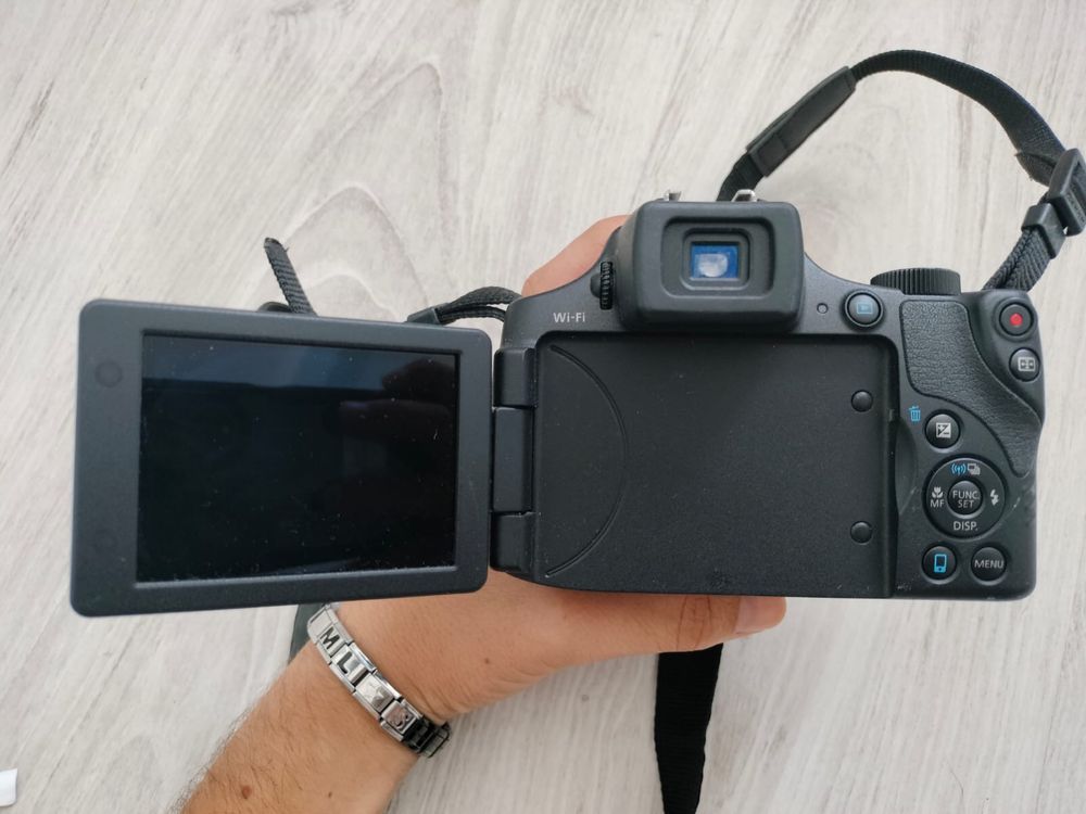Canon SX60 HS com tripé