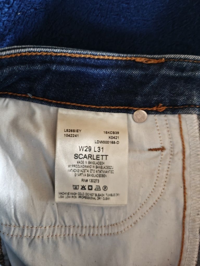 Damskie spodnie jeansowe Lee jak nowe