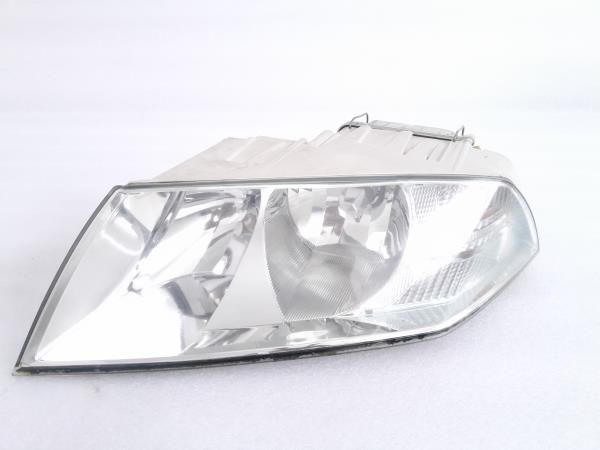 Ótica / farol esquerda SKODA Octavia II Hatchback (1Z3)