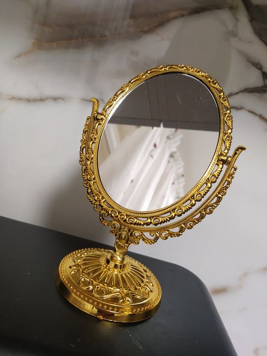 Obustronne złote lusterko
