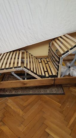 Łóżko drewniane ze stelażem elektrycznym sterowanym  pilotem