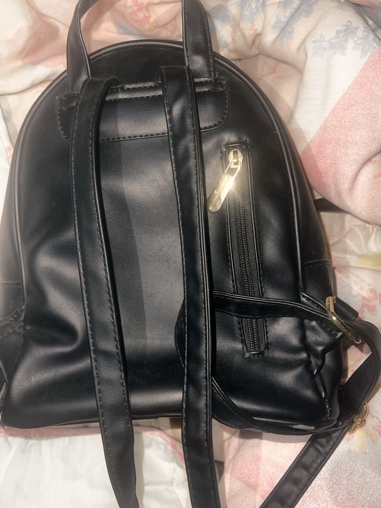 Mochila MK em bom estdo