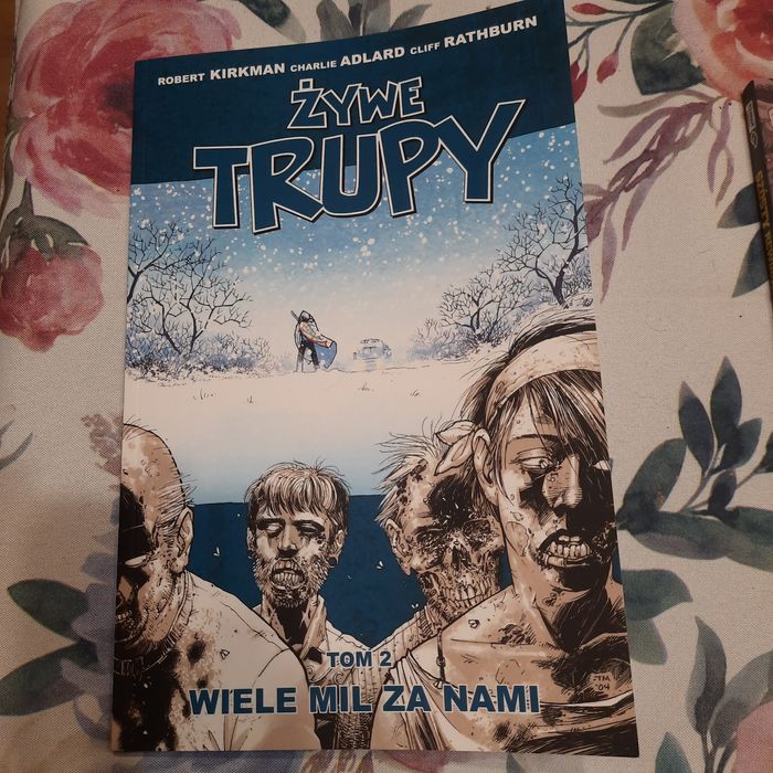 Żywe trupy. Wiele mil za nami , T. 2 - R. Kirkman Rezerwacja