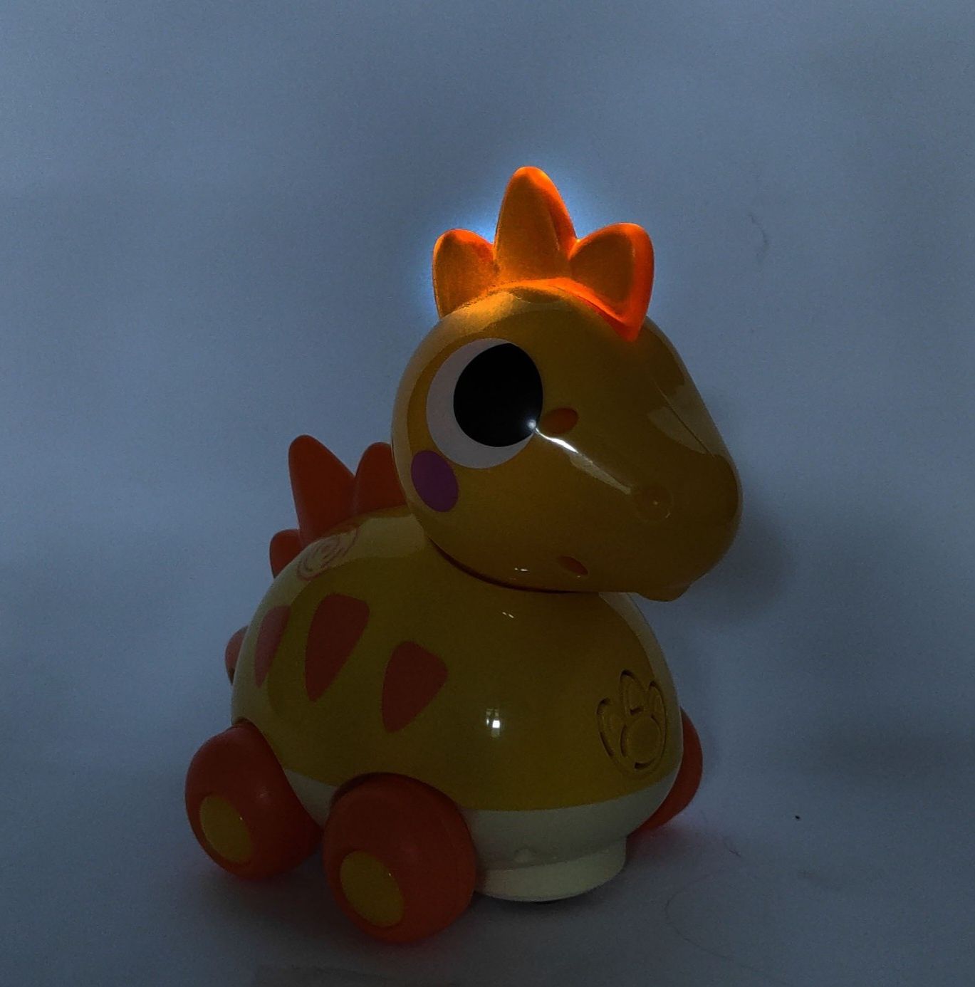Музична каталка динозавр Hola Toys світло, звук, сенсорні кнопки.