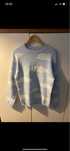 Sweter w chmury