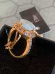 Anel Elite prata e ouro aquamarina com zirconias
