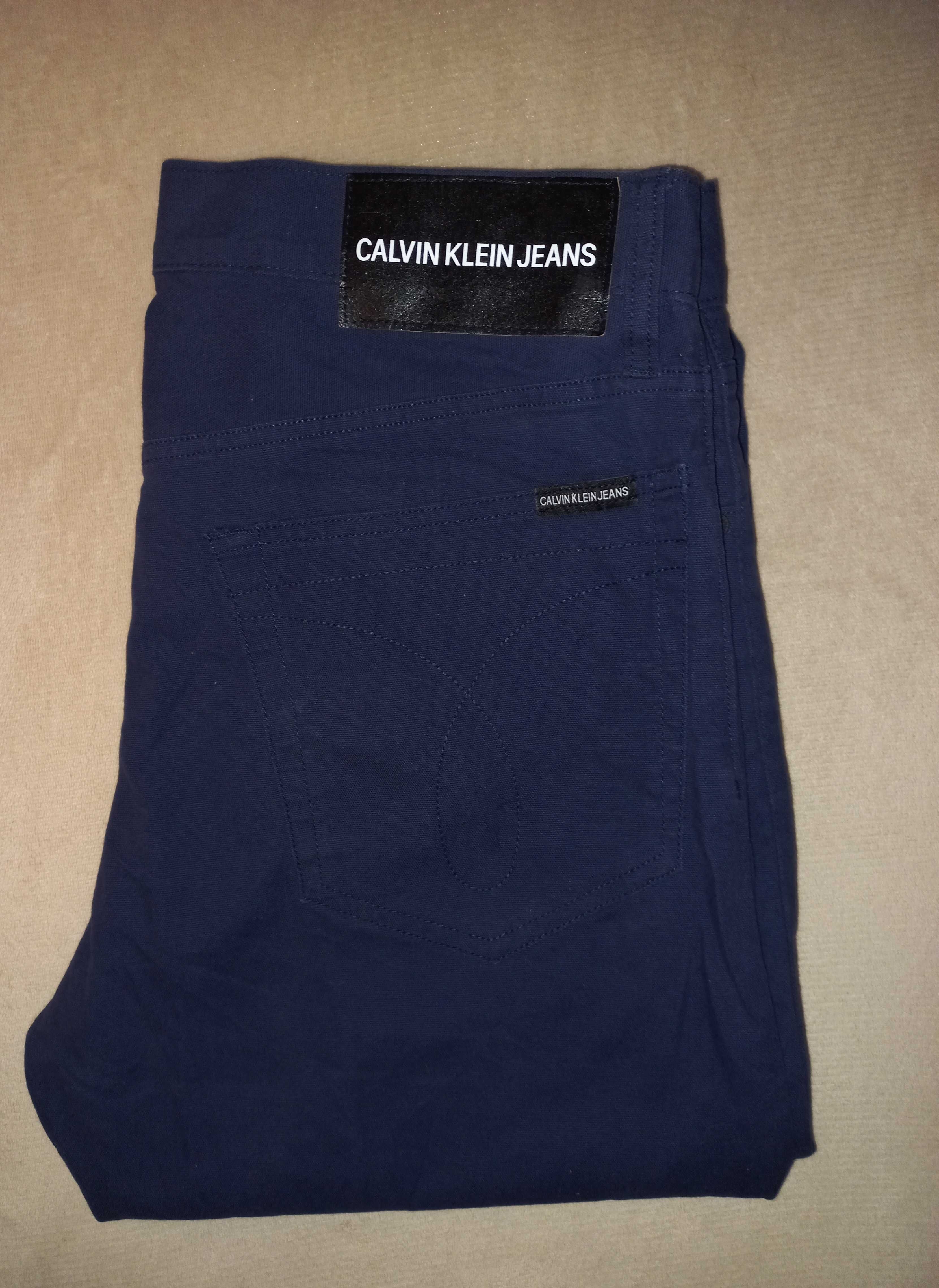 Spodnie Calvin Klein 34/ 32 granatowe