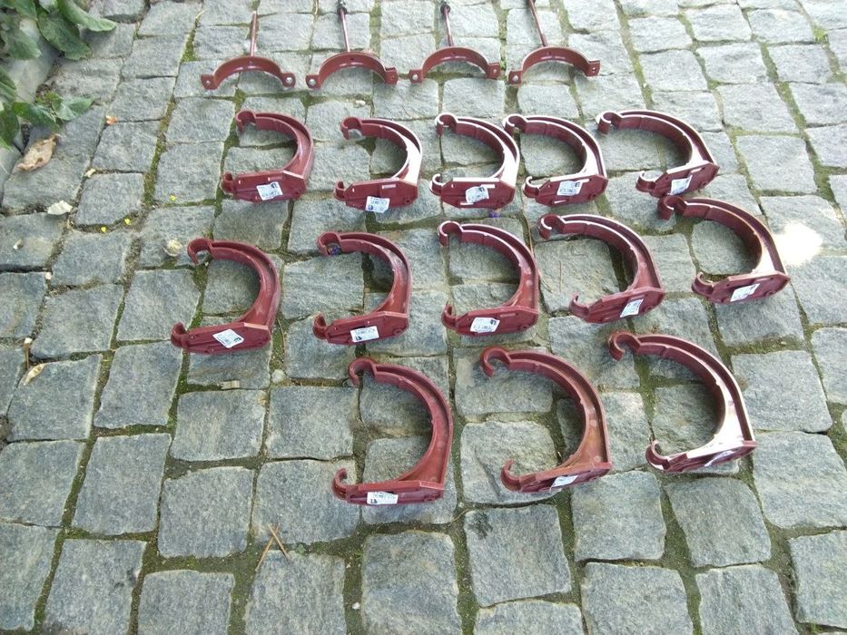 Кріплення та хомути до труб та ринви водостоків нові .