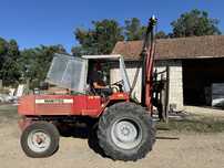 Empilhador Manitou com garfos e balde