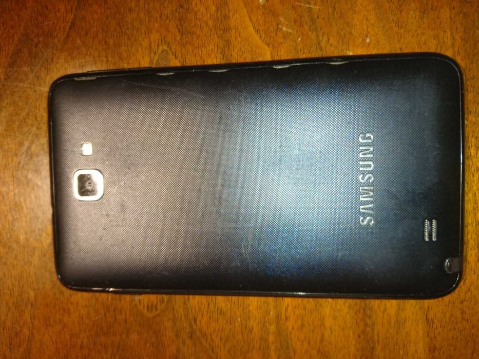 Кнопочный мини телефон на 3 сим.