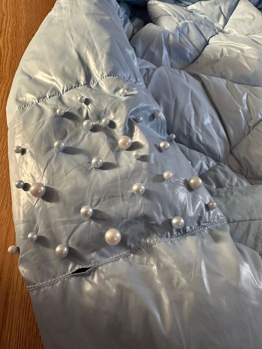 Стильний подовжений пуховик