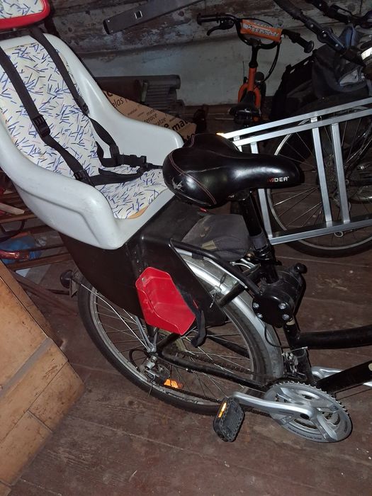 Rower miejski z fotelikiem dla dziecka