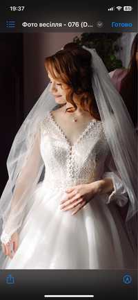 Весільна сукня з рукавами